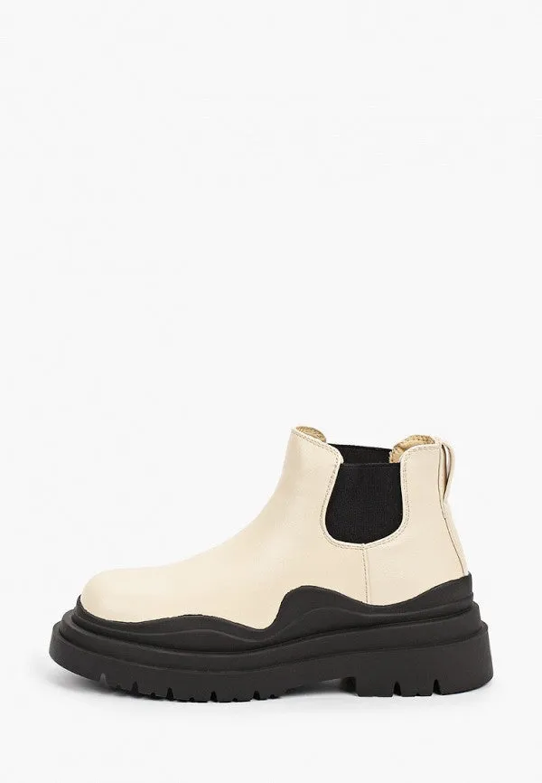 Bottines beiges à semelle crantée