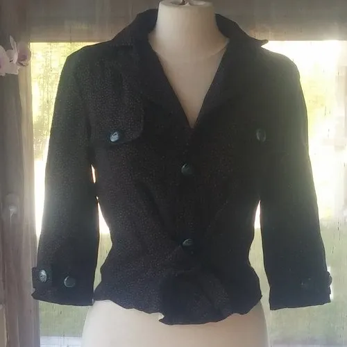 Veste couture marron foncé et points brillants
